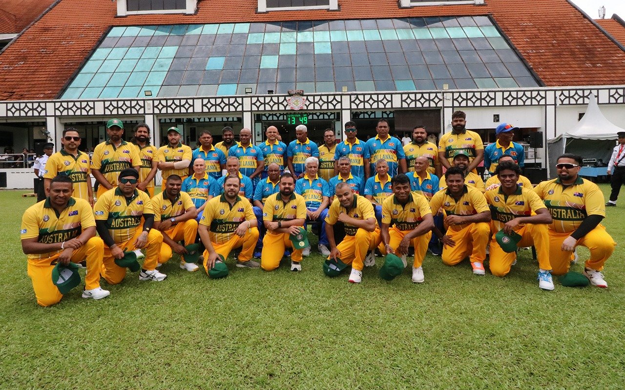 Australian and Sri Lankan cricket teams together on the field